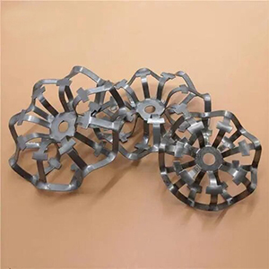 Metal packing for mining industry wastewater treatment applications